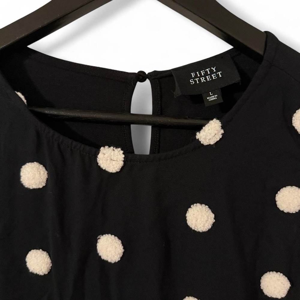 Fifty Street Black blouse with Cream Polka Dots.  Size Large, new w/tags.